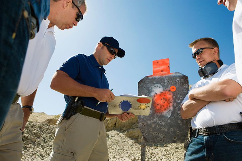 Men With Instructor At Combat Training